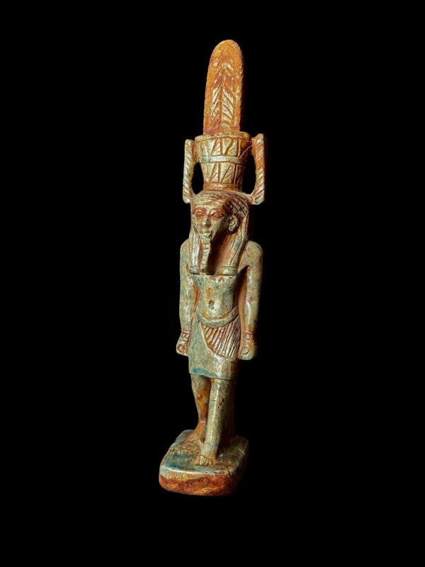 The Egyptian God Nefertum statue made of stone.