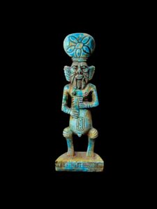 Hand-Carved Porcelain God Bes Statue: Egyptian Home Decor - Image 1