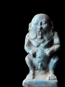 Hand-Carved God Bes Statue: Authentic Egyptian Art Decor - Image 1