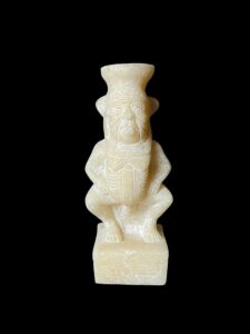 Hand-Carved God Bes Statue: Authentic Egyptian Art Decor - Image 1