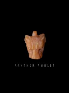 Hand Carved Natural Quartz Panther Amulet - Image 1